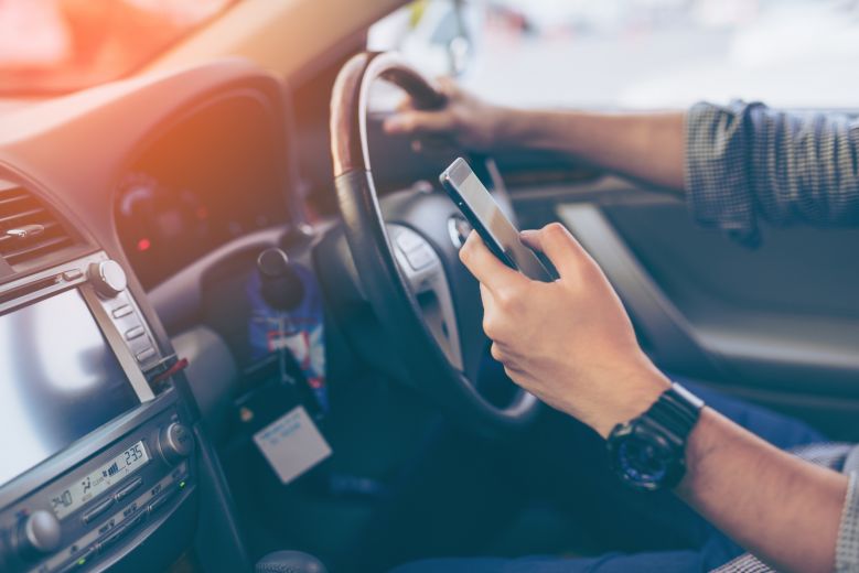 Using mobile phones while driving – data, facts and figures