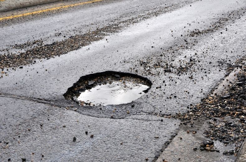 £1.7bn funding boost to target potholes and increase EV charger numbers