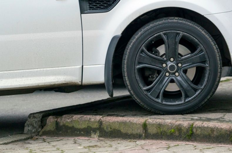 Parking on the pavement - is it illegal? The definitive answer