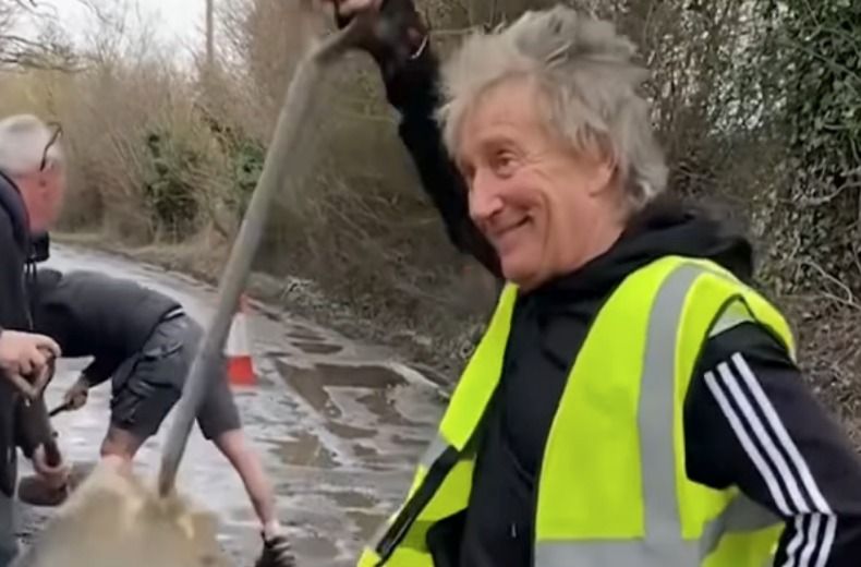 The first hole is the deepest… Sir Rod Stewart fixes road near his home 