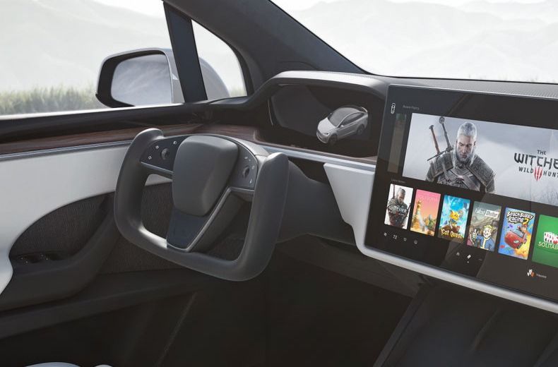 New Tesla with half a steering wheel splits motoring opinion