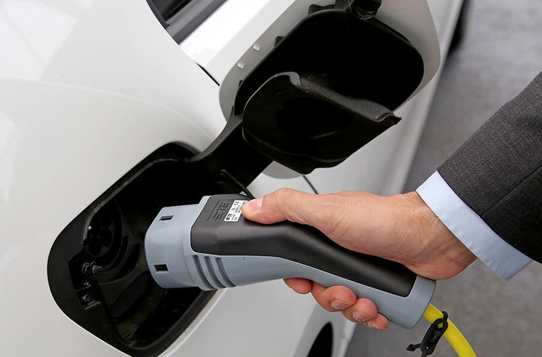 What is the workplace charging scheme for electric cars?